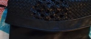 Small black crossbody/over the shoulder purse/bag